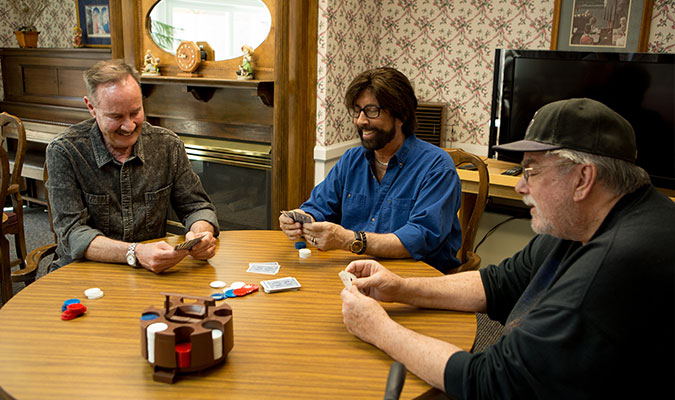 Guys playing cards